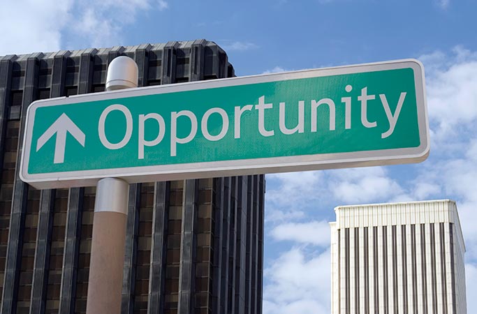 Street sign with Opportunity and a arrow point up