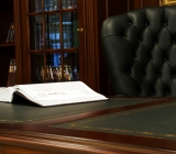 Desk with an open book on it