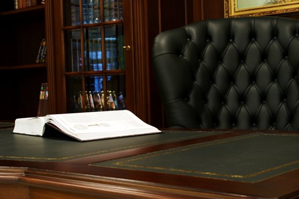 Desk with an open book on it