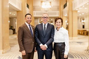 Michael Eizenga poses in the Royal York Hotel with tribute-speakers Justice Ranjan Agarwal and Linda Rothstein