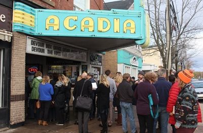 crowd of people outside of ACADIA theatre