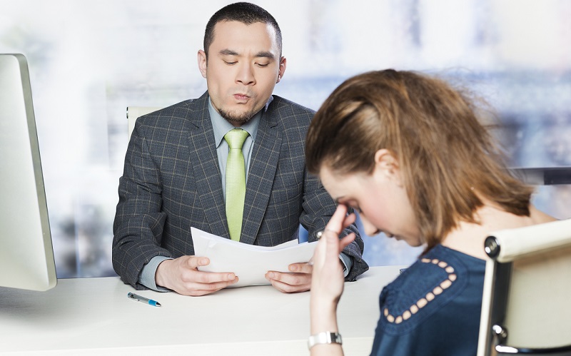 Woman at Job interview, looking dejected