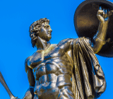 Statue of Achilles with shield raised high