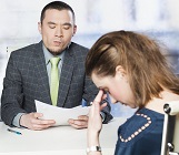 Woman at Job interview, looking dejected