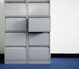 File cabinets with one  door slightly open