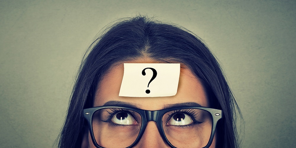 Woman with question mark on forehead