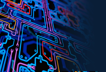 Colourful circuitboard that fades into blue background.